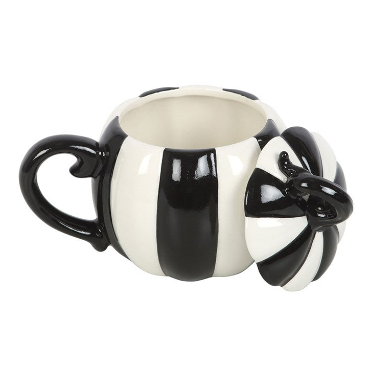 Tasse à couvercle avec motif de citrouilles rayées en noir et blanc
