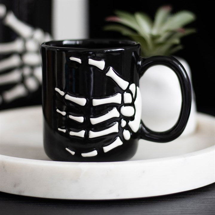 Tasse main squelette