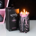 Grande bougie pilier rose en forme de larmes de vampire