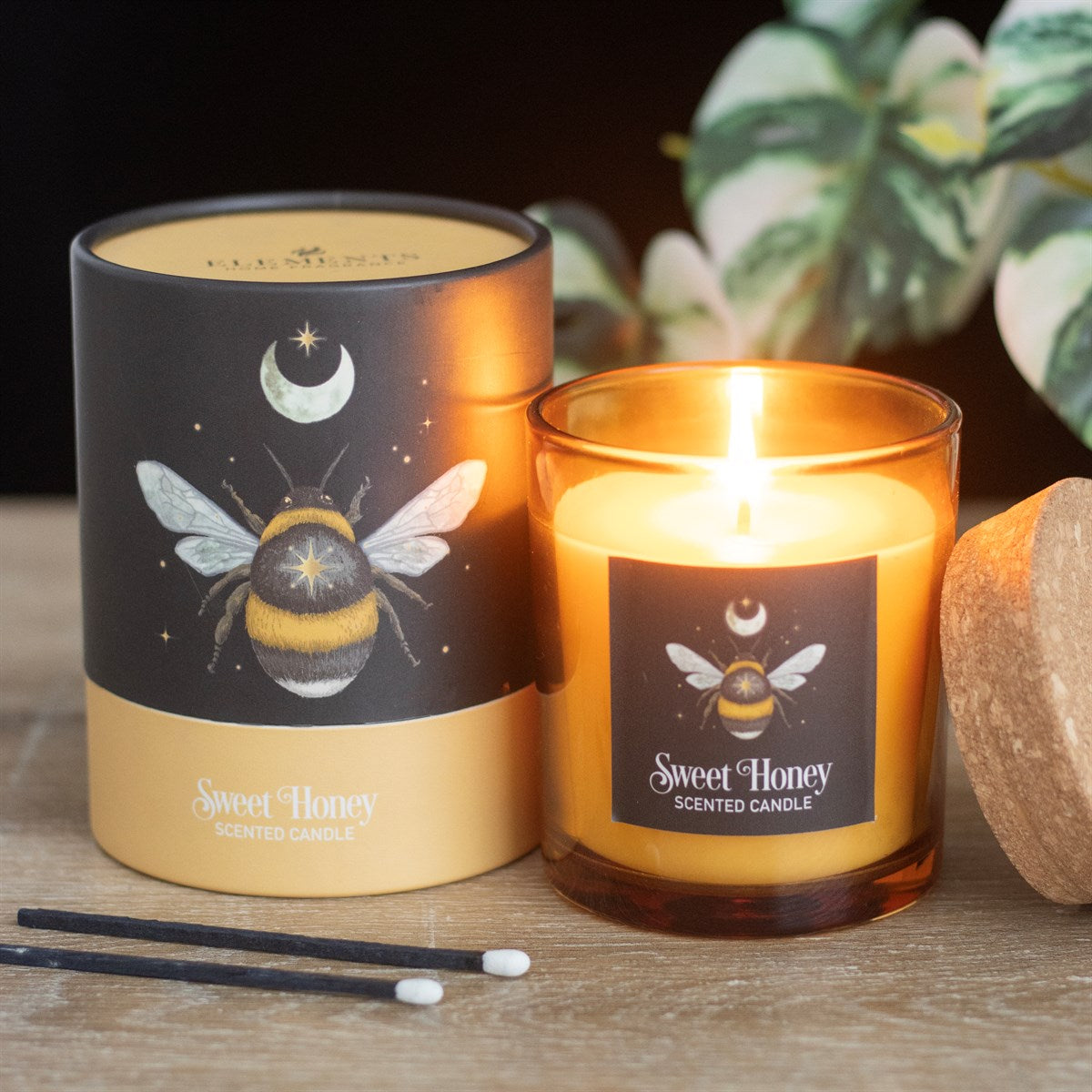 Bougie en verre parfumée au miel doux de la forêt