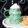 Tasse de sapin de Noël effrayante