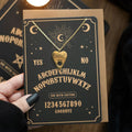 Collier avec planchette de spiritisme et carte de vœux