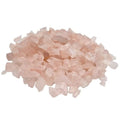 Eclats de pierres précieuses de quartz rose en vrac