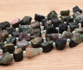 PERLES PIERRES BRUTES 10 X 17MM TOURMALINE VERTE A ( lot de 10 )