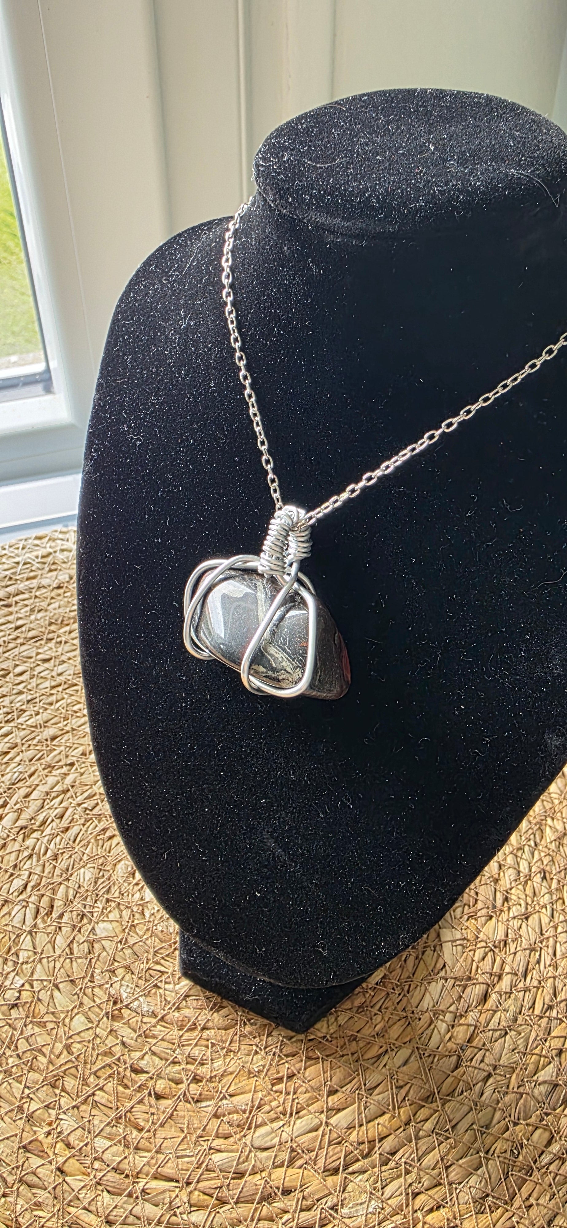 Collier artisanal « Œil du Guerrier »