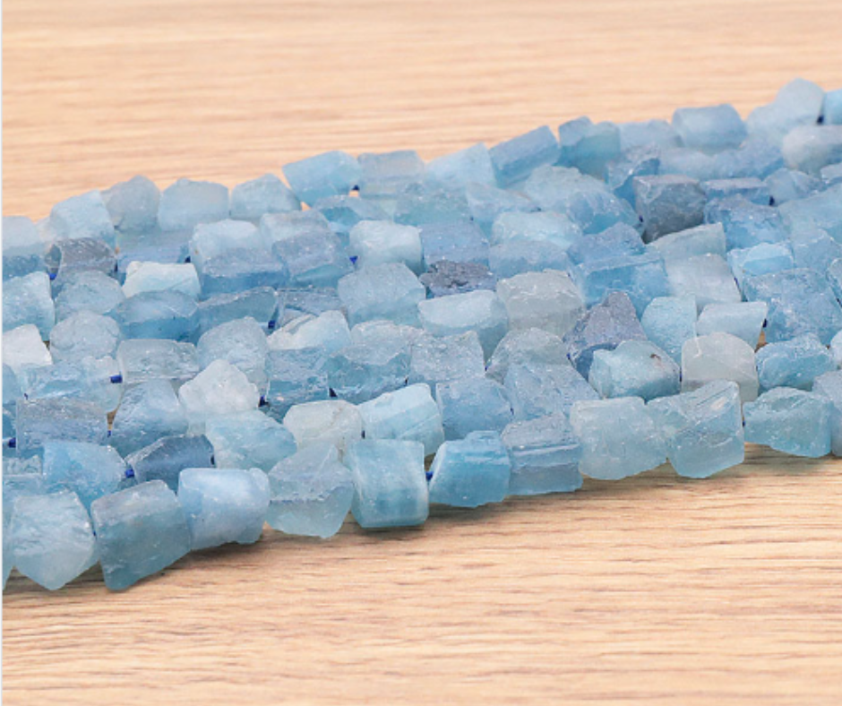 PERLES PIERRES BRUTES 08 X 10MM AIGUE MARINE NAMIBIE AA ( lot de 10 )